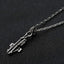Sterling Silver Skeleton Hugging Cross Necklace
