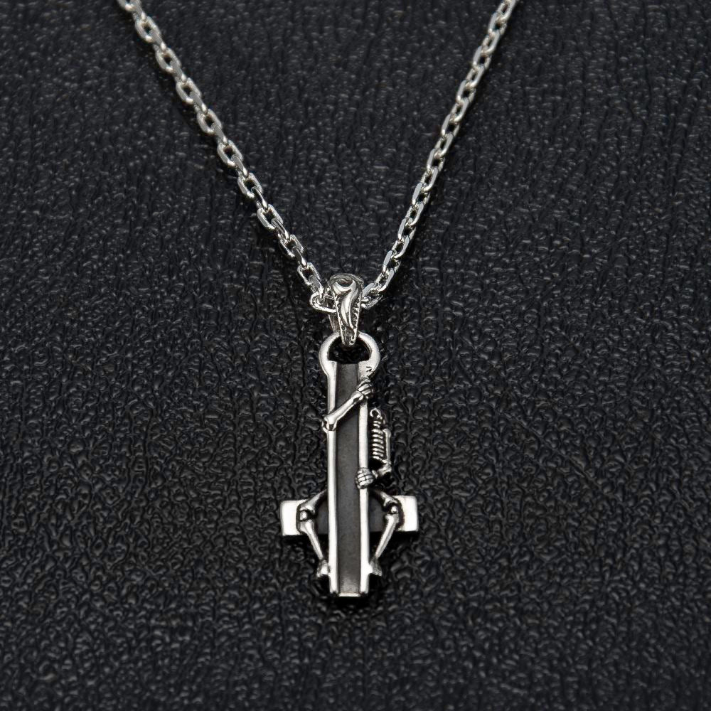 Sterling Silver Skeleton Hugging Cross Necklace